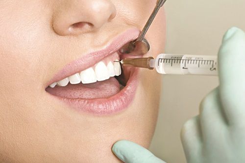 Nhổ răng hàm không đau bằng công nghệ mới 2