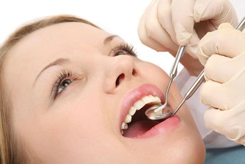 Lắp răng sứ bị sưng lợi - Nguyên nhân bạn nhất định phải biết 3